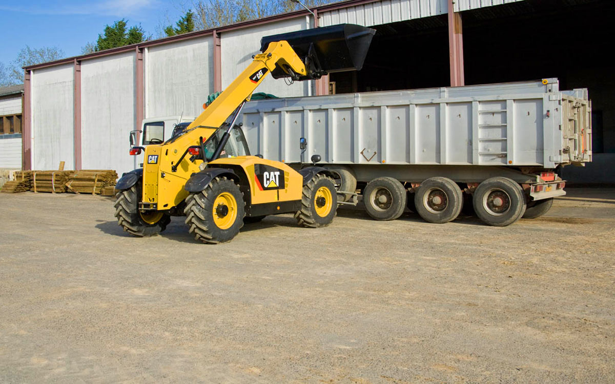 погрузчик фронтальный телескопический Caterpillar
