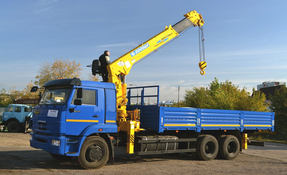 КамАЗ 65117 с краном манипулятором Soosan