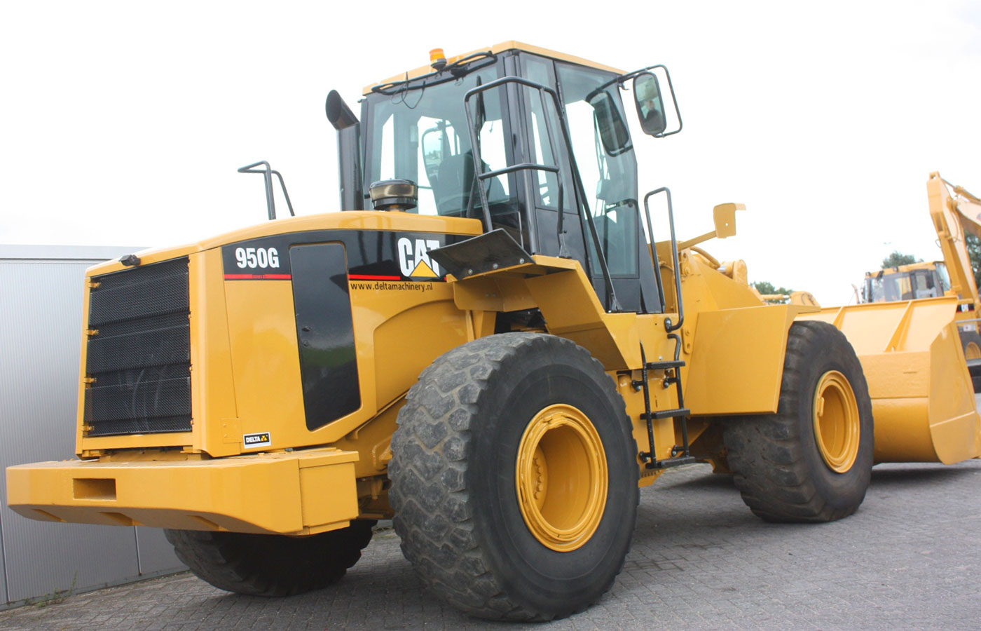 фронтальный погрузчик Caterpillar 950 g