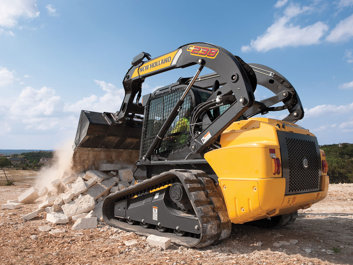 гусеничный мини погрузчик New Holland C 238
