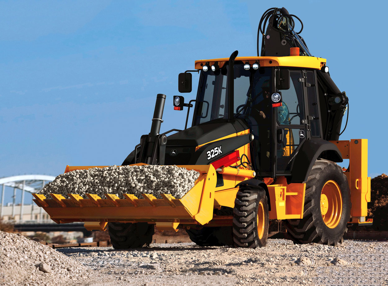 американский колесный экскаватор погрузчик John Deere 325K