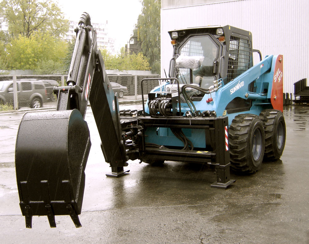 Sunward SWL 3210 с траншее копателем